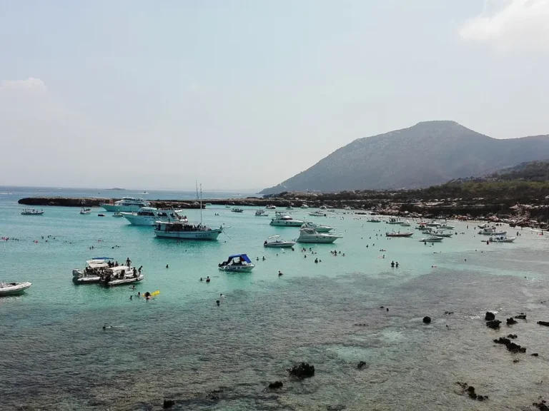 Turquoise bay with boats on the Akamas coast