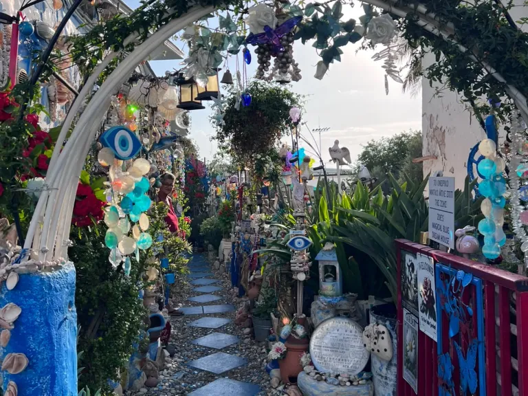 Entrance arch and blue garden path at the Blue Shell House in Paphos