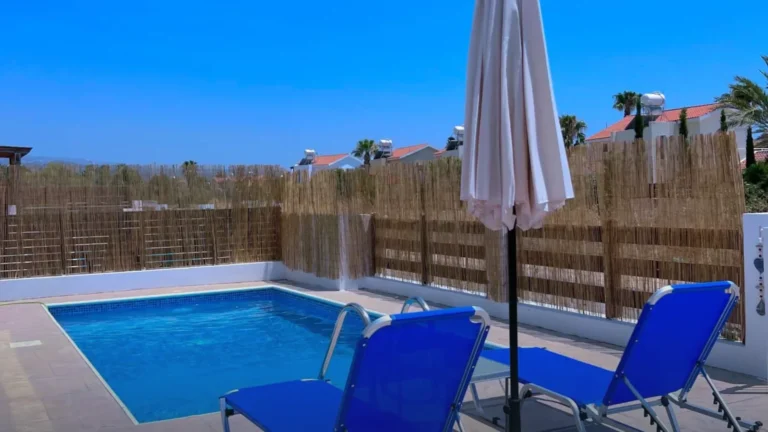 Private pool with sun loungers at Villa Halia in Coral Bay, Cyprus
