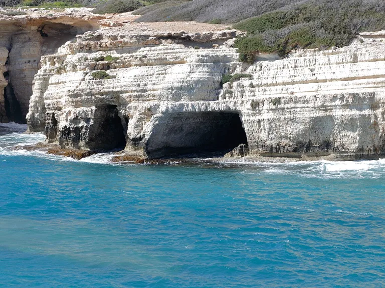 Sea caves in the limestone cliffs near Peyia