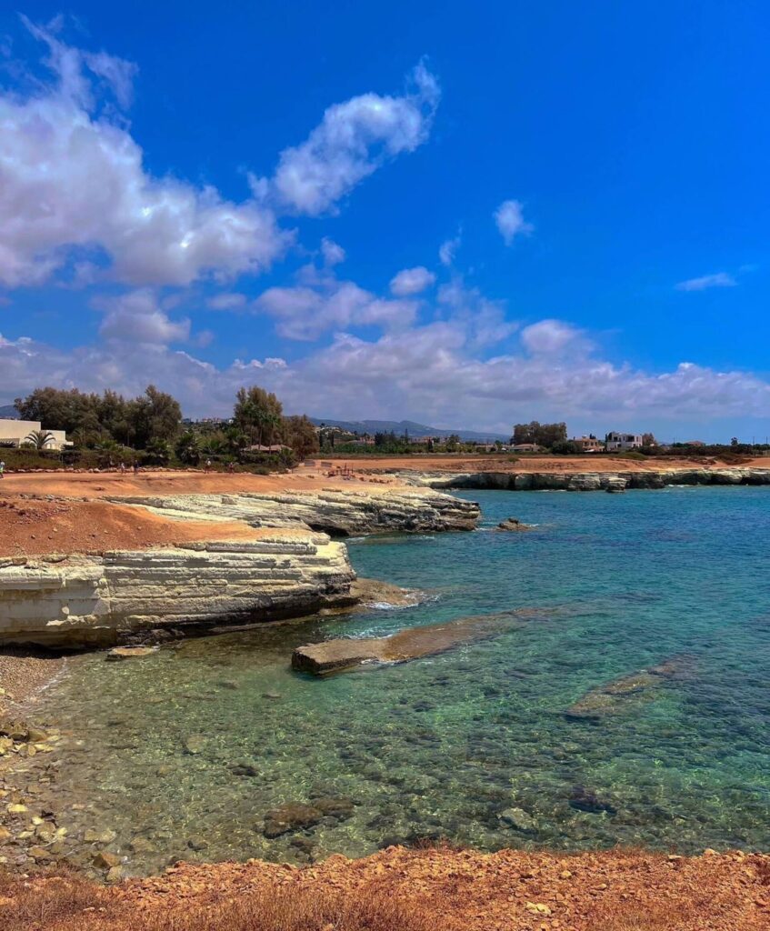 Turquoise rocky cove on the coast near Peyia